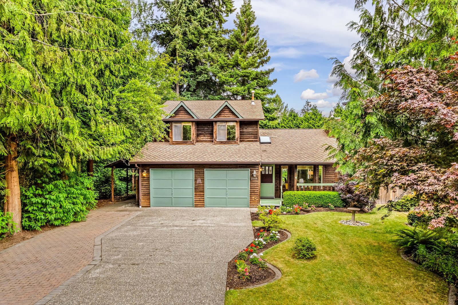 Wood-sided Craftsman home sold by Quorum agents in the Seattle area